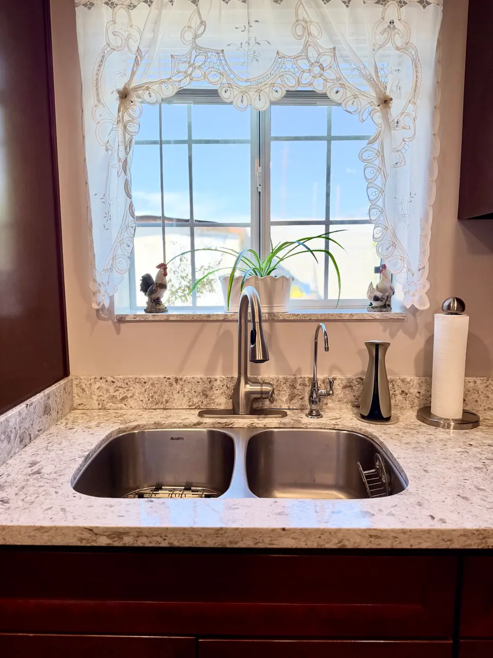 Kitchen sink under a sunny window